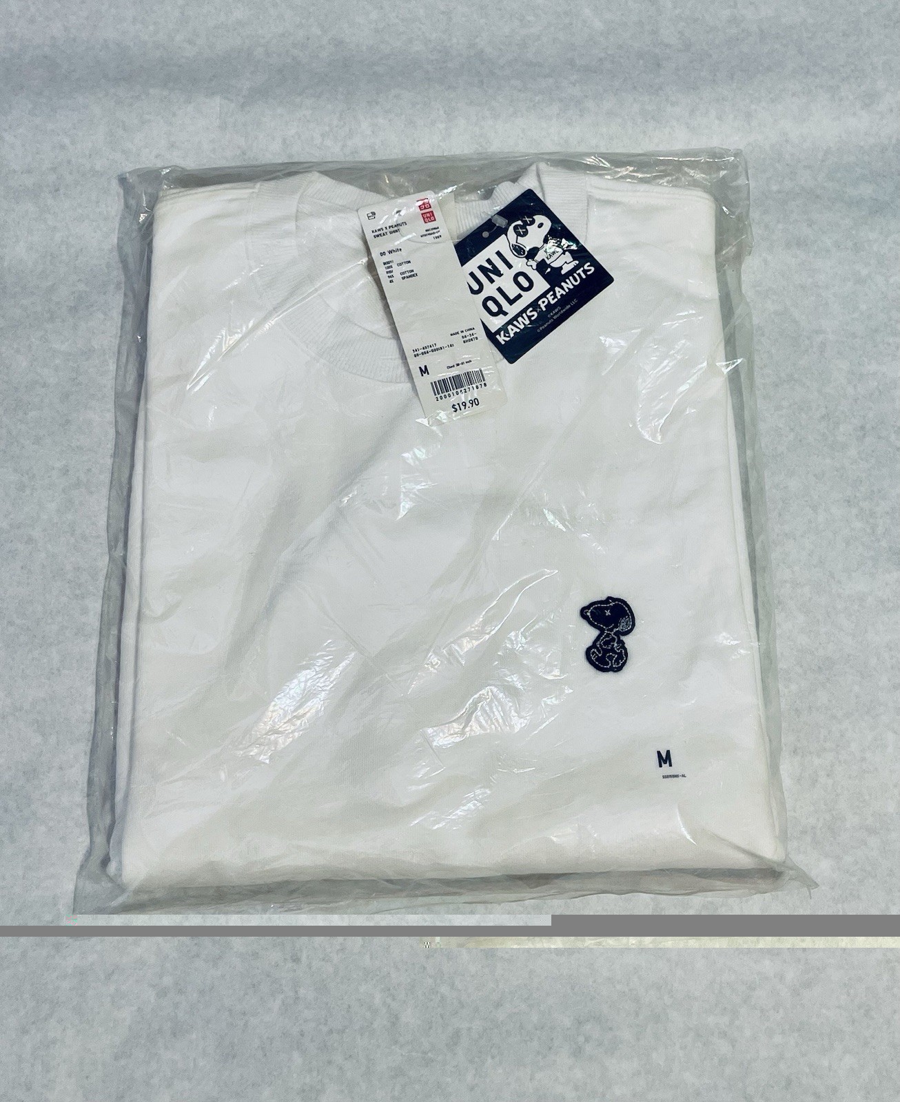 Uniqlo Men’s Kaws collaboration white long sleeve shirt size medium new in bag