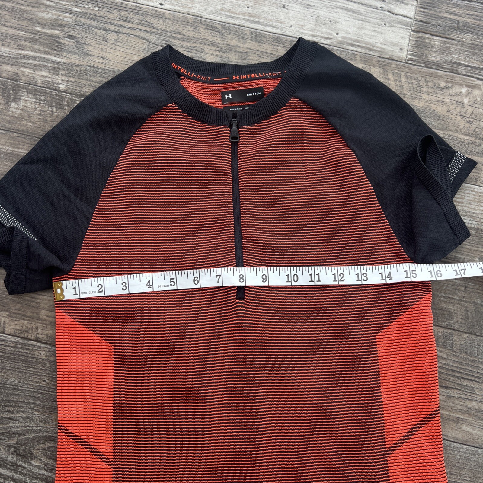 Small Under Amour 1366503 002 Men's IntelliKnit 1/4 Zip Shirt black orange $85 gallery