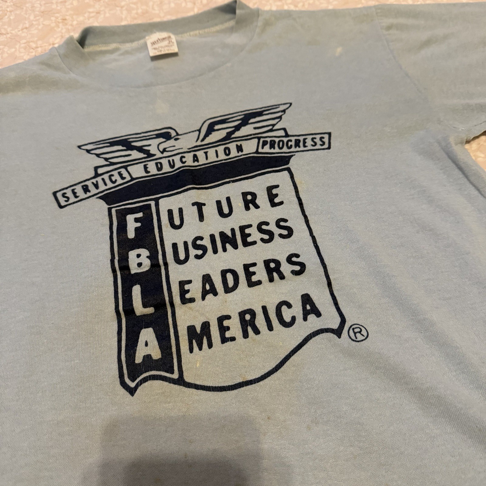 Vintage 70’s Sportswear FBLA Logo Blue Paper Thin Tee Shirt Size Medium gallery