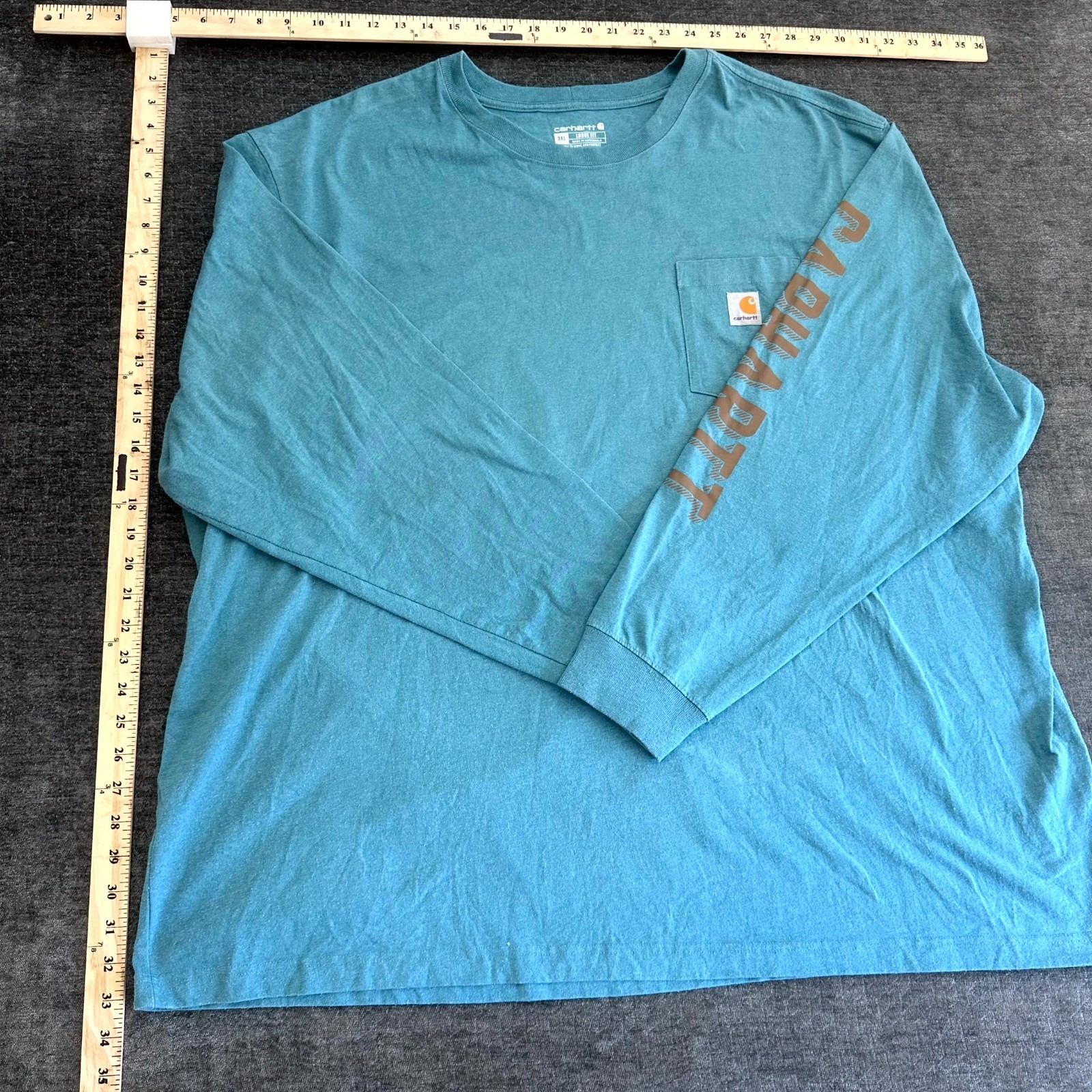 Carhartt Pocket T-Shirt Mens 3XL Teal Blue Spellout Logo Long Sleeve Loose Fit gallery