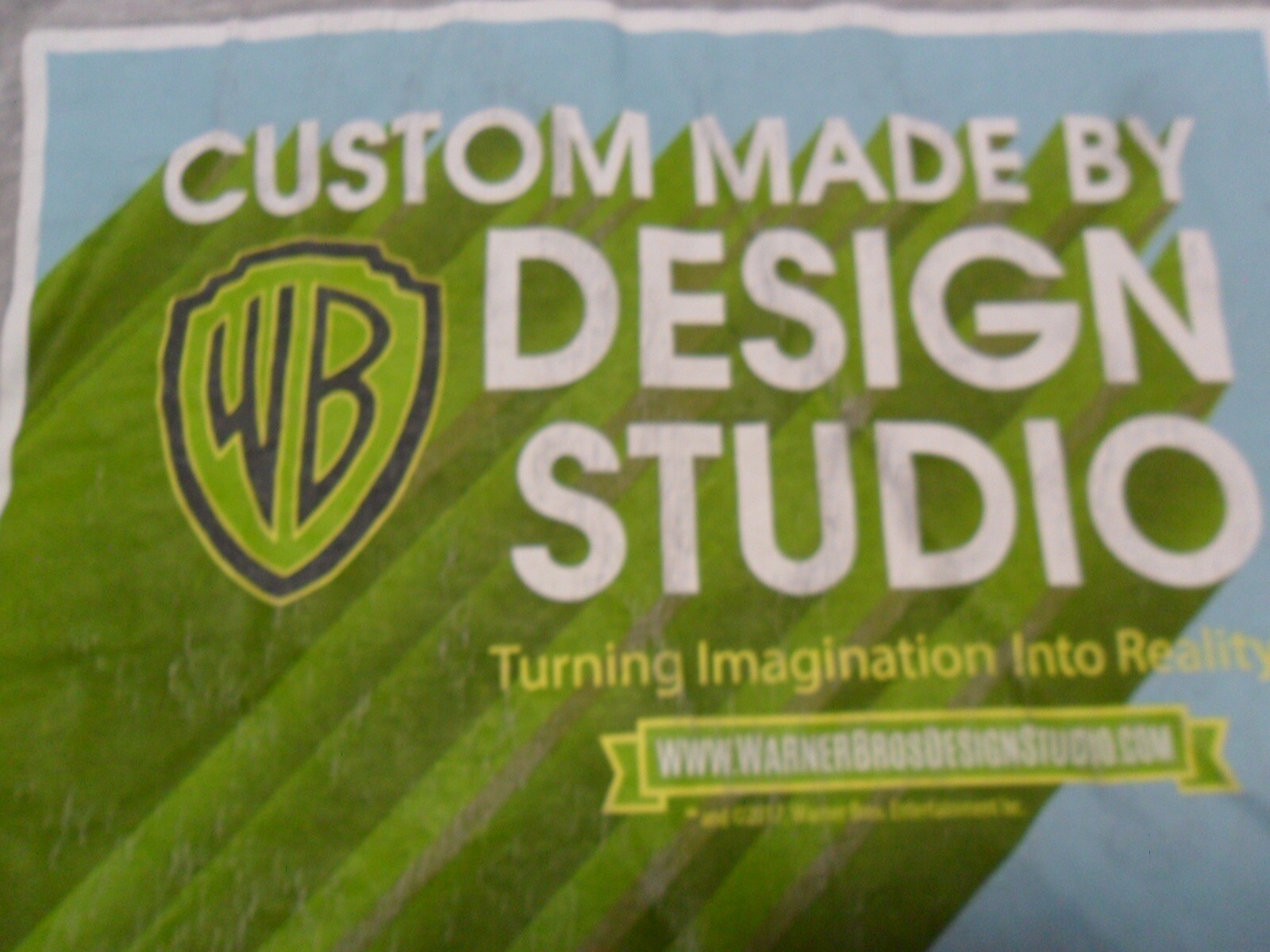 Small Warner Bros Design Studio Turning Imagination To Reality Damaged T Shirt gallery
