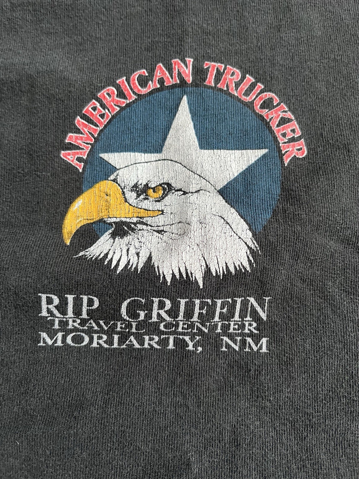 VintageAmerican Trucker Rip Griffin Travel Center Black Pocket Graphic Tee gallery