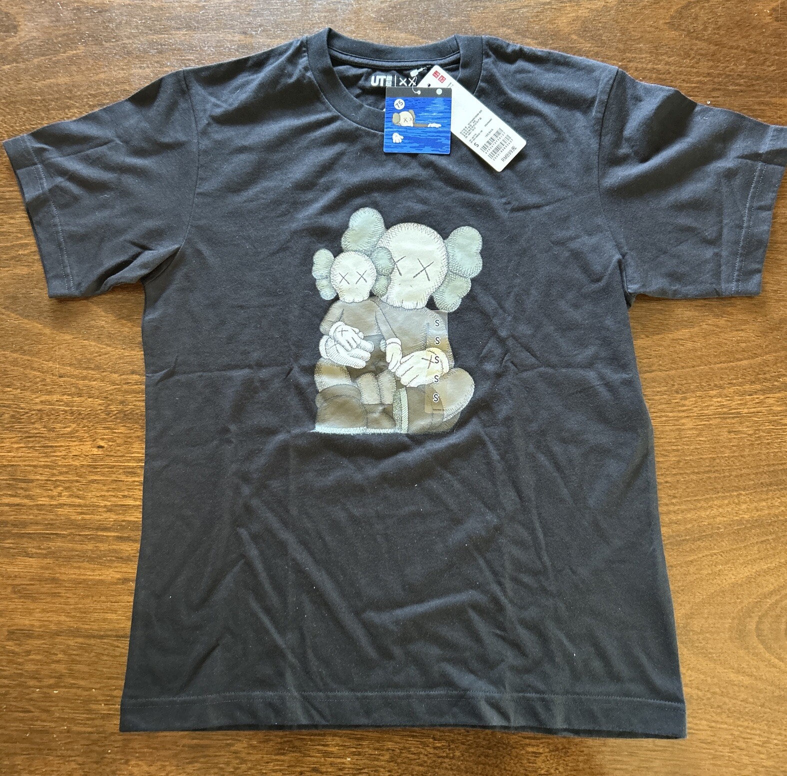 Uniqlo x Kaws UT Short Sleeve Graphic T-Shirt Black NWT Size Small gallery