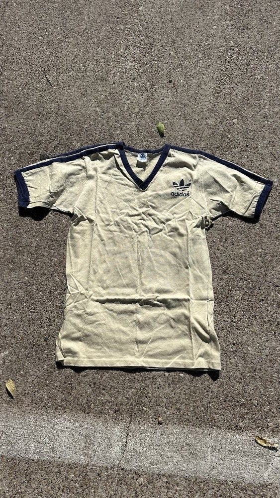 1980s Adidas Ringer Tee on a Bantam Tag Size L Cream/Blue Vneck
