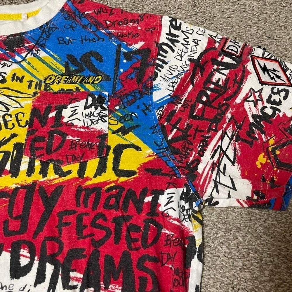 Multicoloured graffiti style graphic tee with bold designs gallery