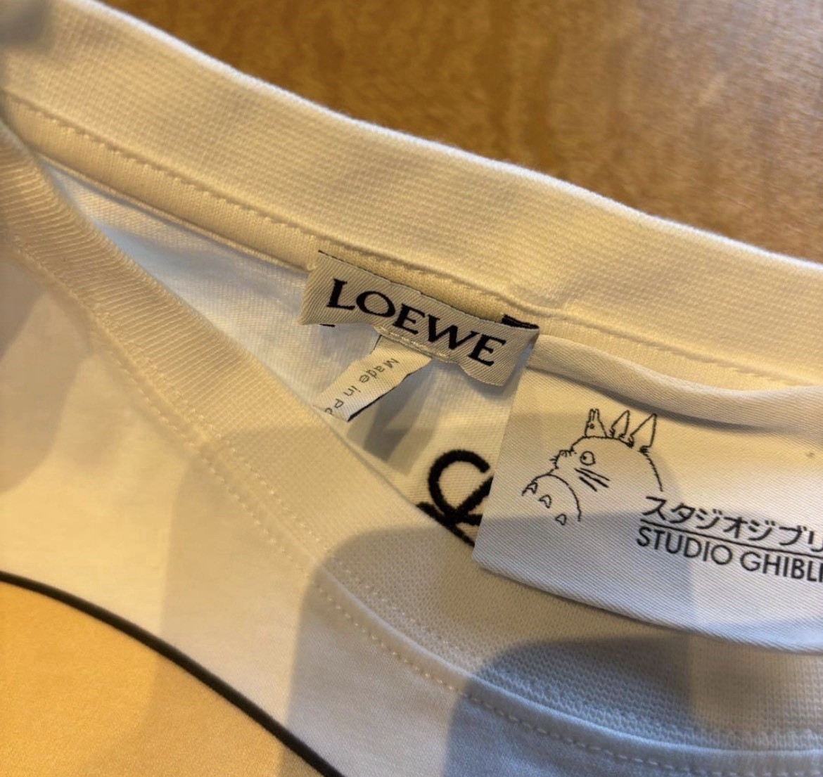 Loewe Howls Moving Castle Ghibli T-Shirt White Bleach with Earring Used Japan gallery