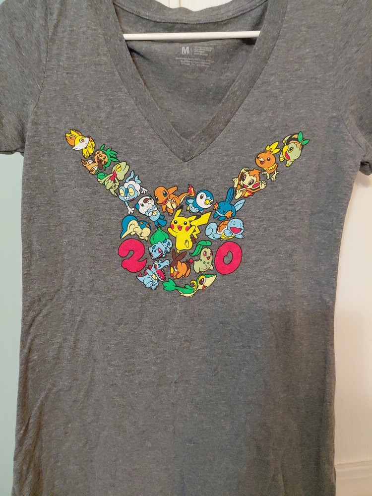Pokemon Center 20th Anniversary V-neck Grey T-Shirt – Women’s M **description