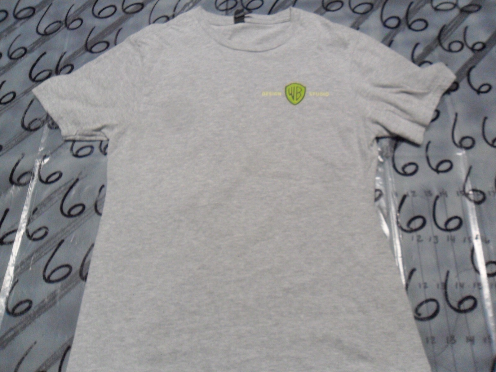 Small Warner Bros Design Studio Turning Imagination To Reality Damaged T Shirt