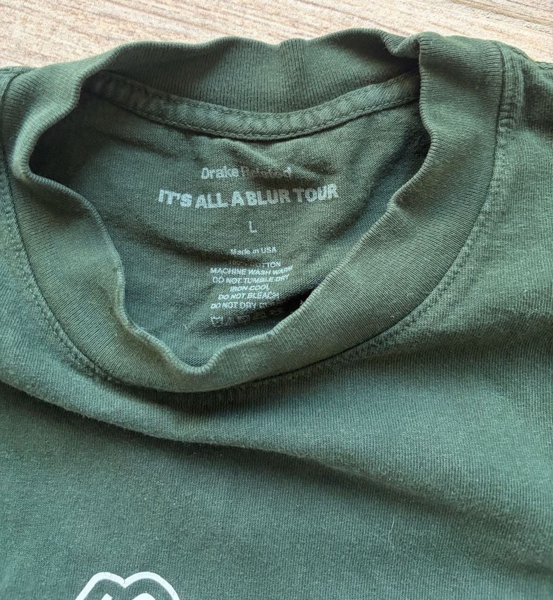 Drake It's All A Blur Tour 'I Like What Drake Likes' Green Graphic T-ShirtCrack gallery