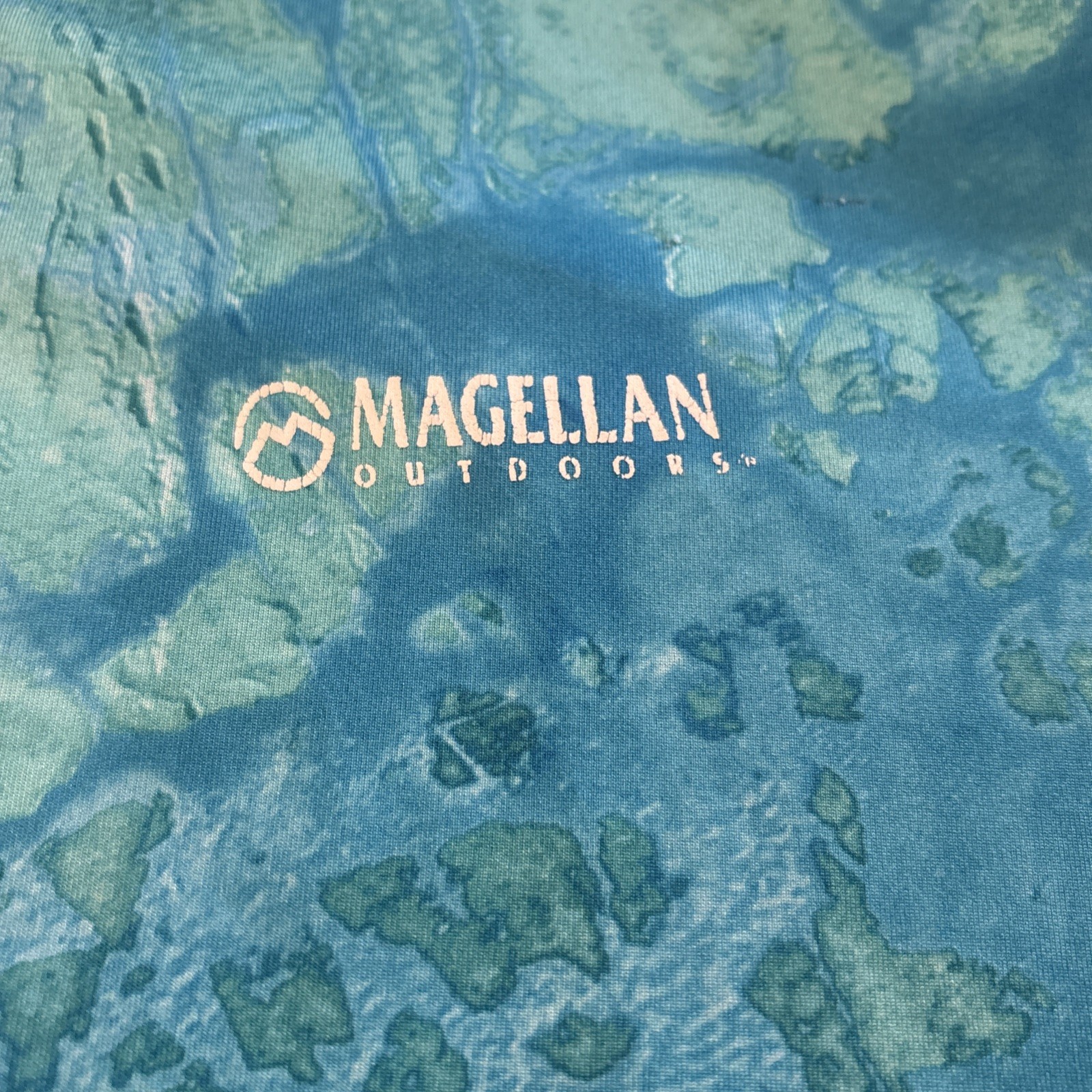 Magellan Fishing T-Shirt Aqua Blue Realtree Fish Camouflage Reversible Size Sm gallery