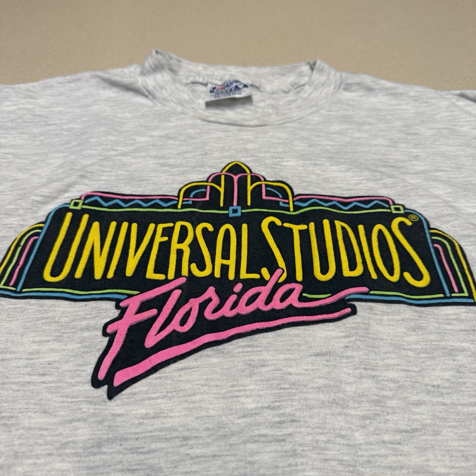 Vintage 90s UNIVERSAL STUDIOS FLORIDA NEON Beefy T-shirt See Pics Spots XXL USA gallery