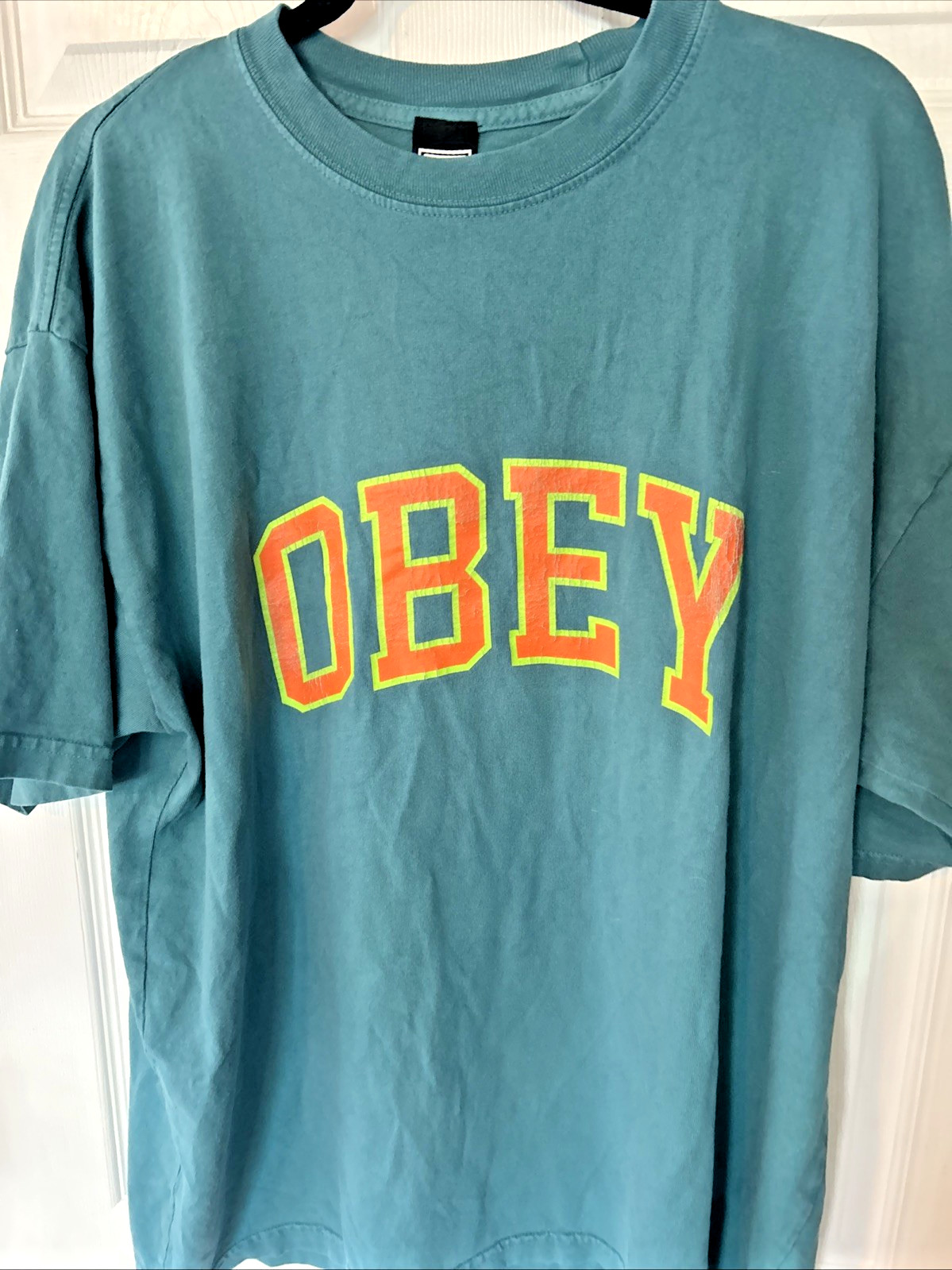 Vintage OBEY Men's XL Teal Green W/ Orange/ Lime Green Graphic Logo T-Shirt gallery