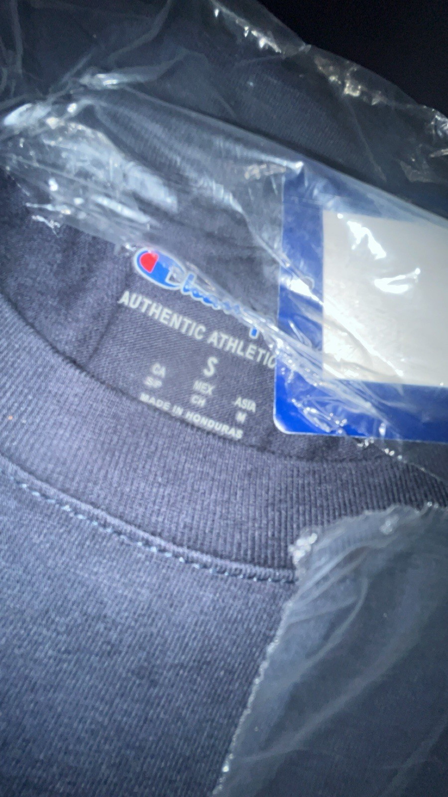 Three champion T-shirts, and one pair of socks