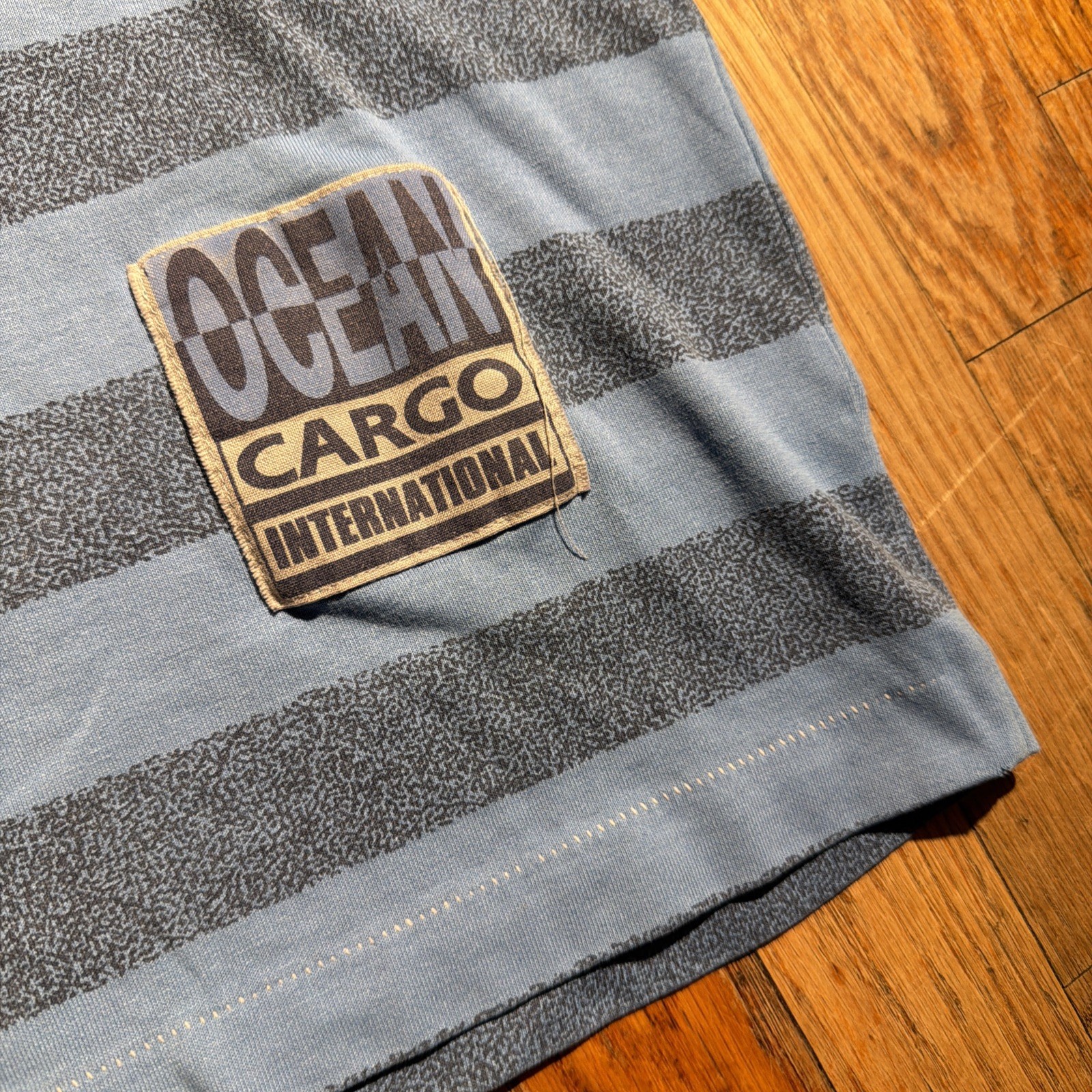 Vintage 90s Todays News T-Shirt Mens Large Striped Ocean Cargo International gallery
