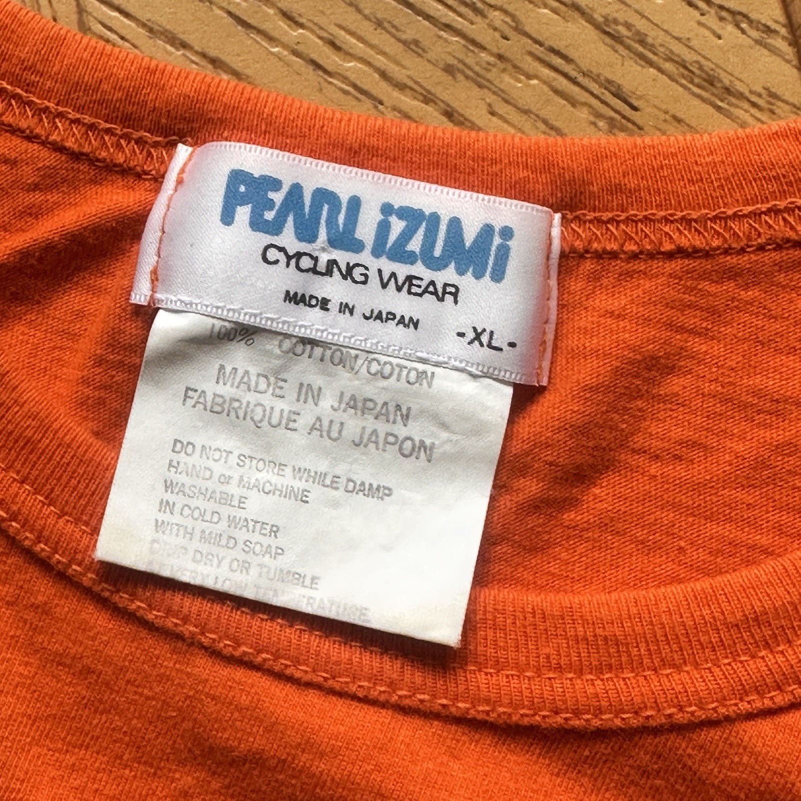 Vintage Pearl Izumi T-Shirt XL Single Stitch Orange w Back Pocket Made In Japan gallery