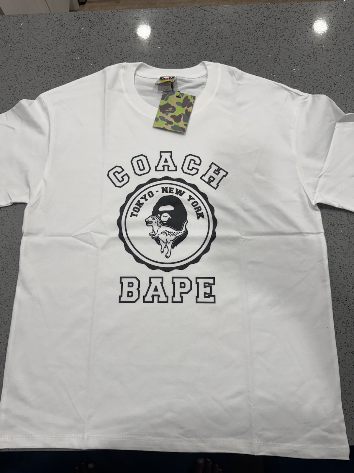 A Bathing Ape x Coach Men's White Graphic Print Crew Neck Short Sleeve Tee gallery