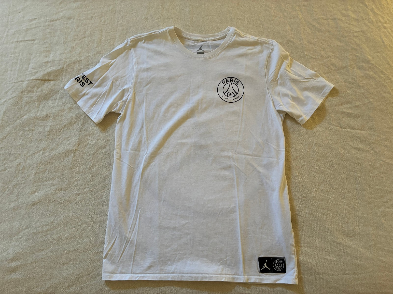 Nike Air Jordan Paris Saint-Germain Men’s PSG White Graphic T-Shirt, Size - L gallery