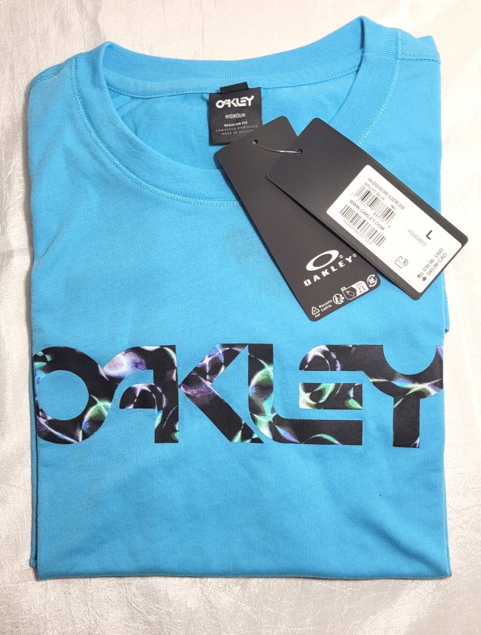 Oakley Kaleidoscope Hydrolix UPF 30+ Raw Cut Sleeveless Shirt - Bright Blue - L gallery