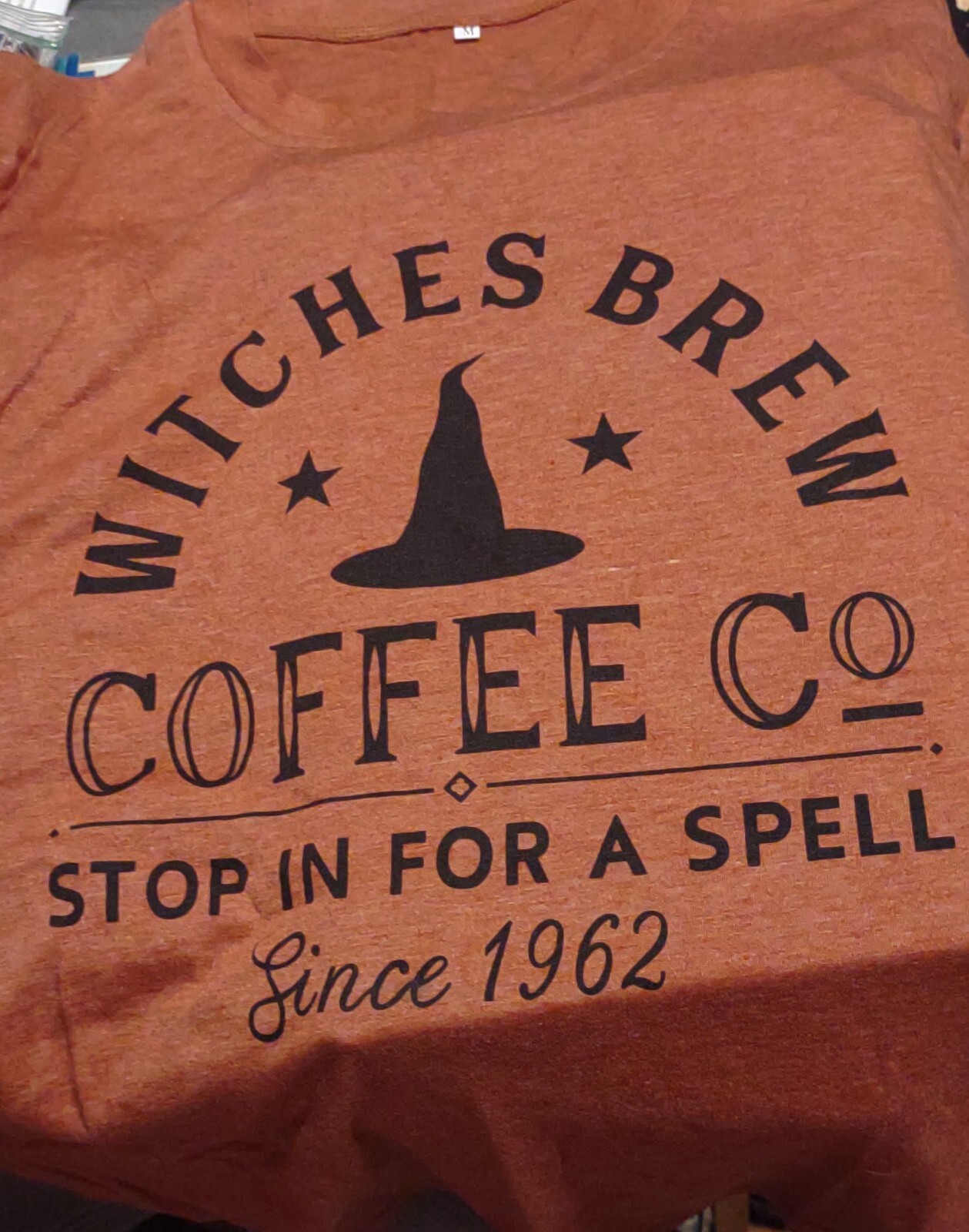 T-shirt “Witches Brew Coffee Co. Stop In For A Spell”, Size Medium- Rust Color