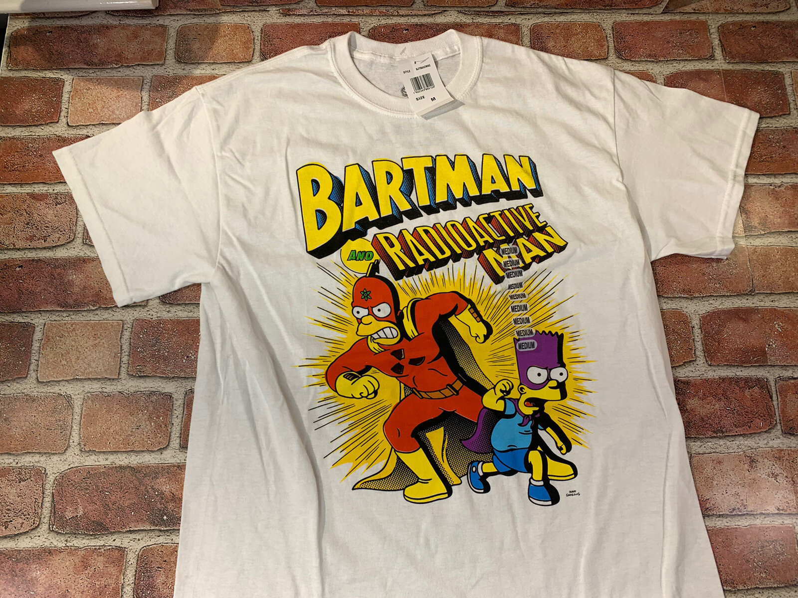 Simpson’s- Bartman And Radioactive Man• WhIte T-Shirt/ Bart & Homer• Medium• NWT