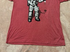 Junior Mens Dellarious Red Astronaut Holding Flower Graphic T-shirt. Size Large