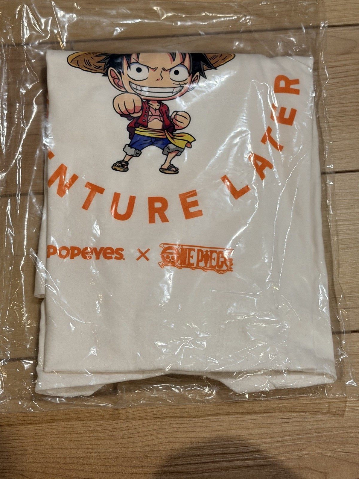 Limited Release Popeyes x One Piece Monkey D Luffy Large T-Shirt w/ Keychain gallery