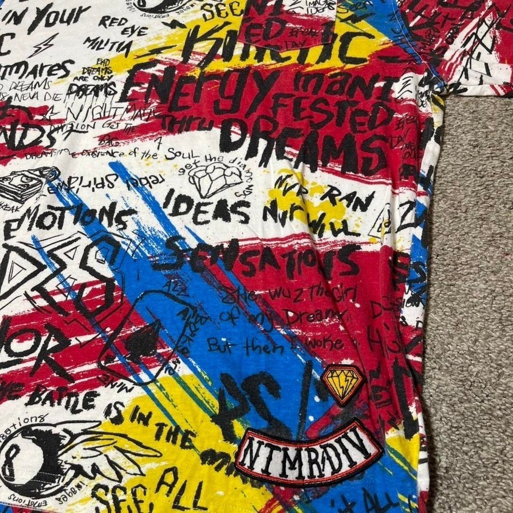 Multicoloured graffiti style graphic tee with bold designs gallery