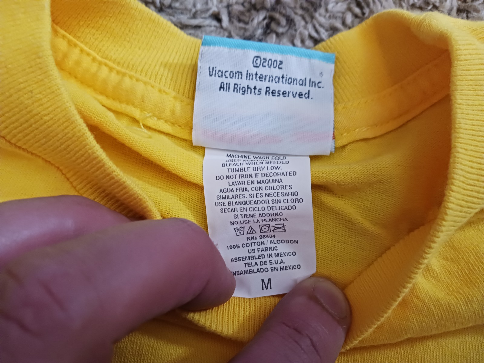 Vintage 2002 Nickelodeon SpongeBob SquarePants Nudie Pants Yellow TShirt Size M gallery