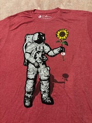 Junior Mens Dellarious Red Astronaut Holding Flower Graphic T-shirt. Size Large