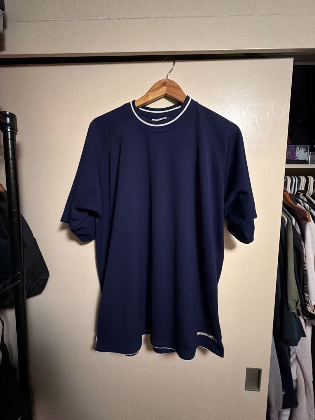 Vintage 90s Reebok Navy Blue and White Trim Mesh Performance Jersey T-Shirt gallery