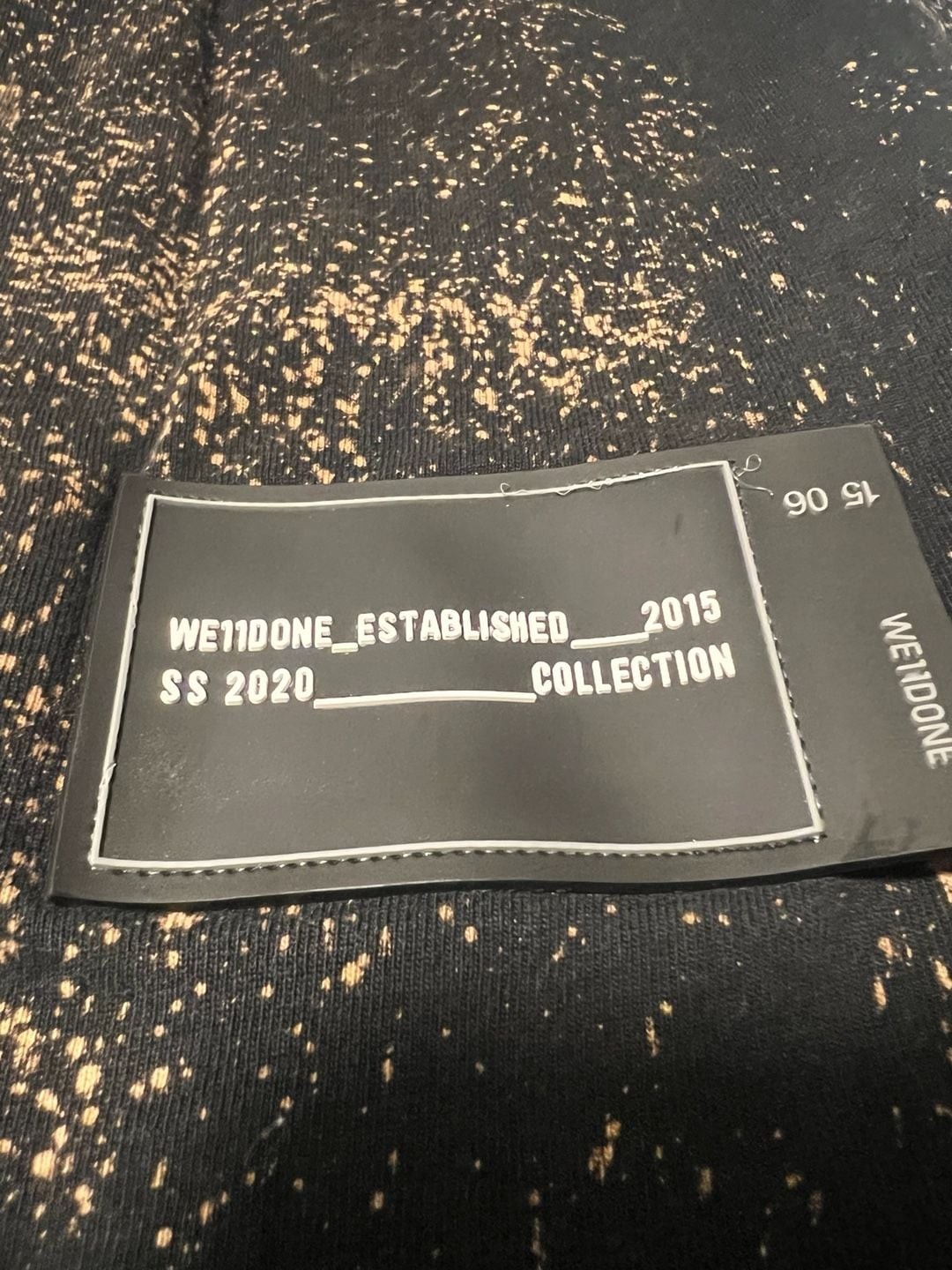 WE11DONE SS 2020 Multi-Bleach Splatter Logo Oversized T-Shirt gallery