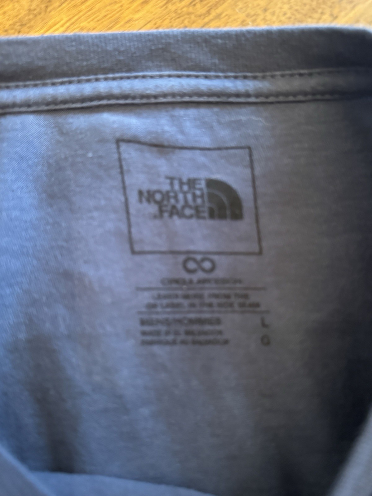 The North Face Short Sleeve Tshirt Never Worn Blue And Black. gallery