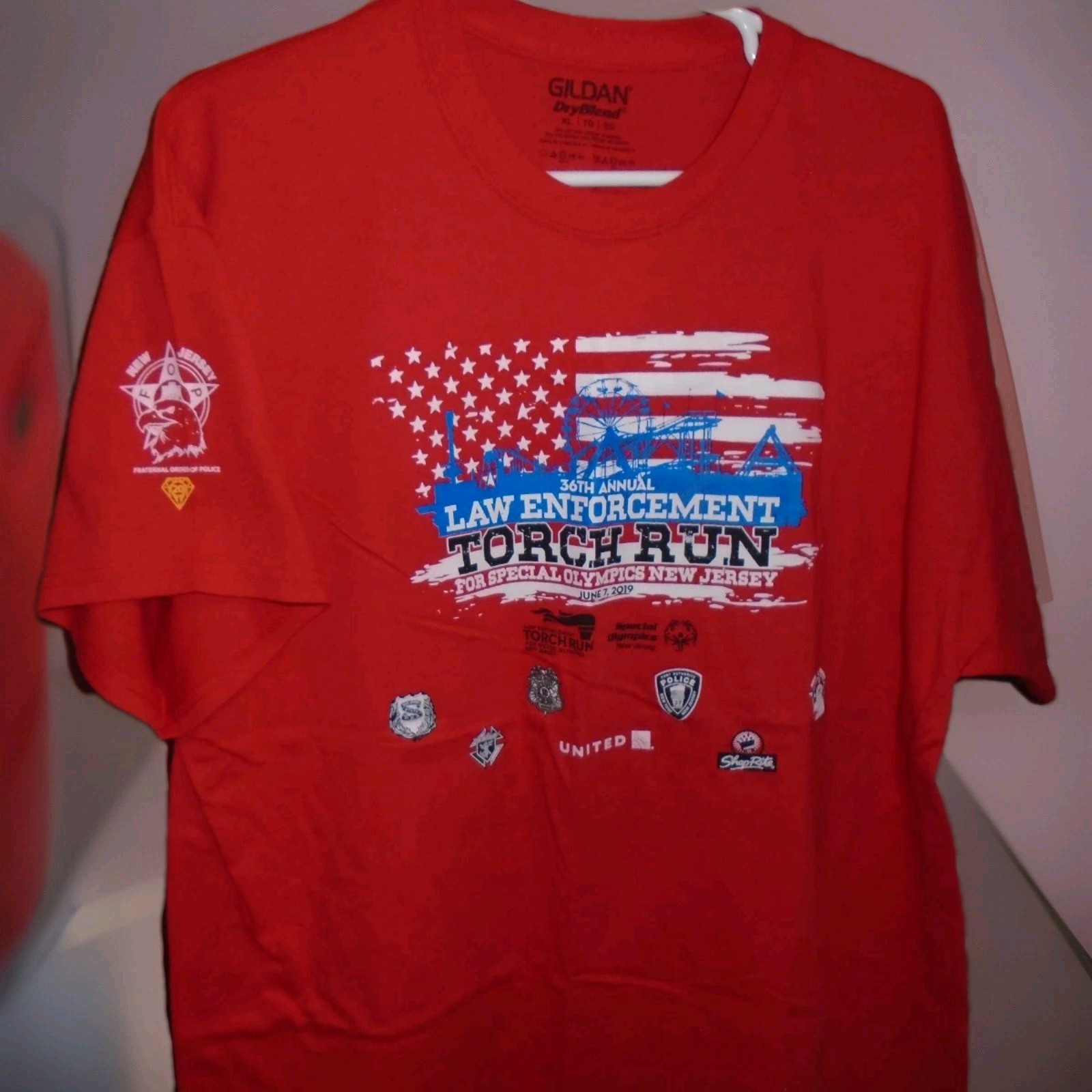 36TH ANNUAL LAW ENFORCEMENT TORCH RUN 2019 MENS TSHIRT WORN 1 TIME gallery